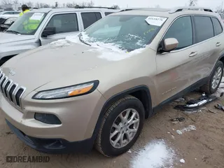 2014 Jeep Cherokee Latitude with VIN 1C4PJMCS4EW264522, listed as a IAAI auction lot 41618276 with 162,652 mi miles. Bid and sale history available at carsss.com. Image 23.