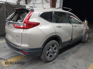 2018 Honda CR-V EX-L z VIN 2HKRW2H89JH671327, wystawiony jako IAAI lot #42159441 z przebiegiem Nie podano mil oraz . Historia ofert i sprzedaży dostępna na DreamBid. Obrazek 4.