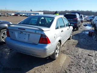 2007 Ford Focus S with VIN 1FAHP34N87W204936, listed as a IAAI auction lot 41755544 with 185,030 mi miles. Bid and sale history available at carsss.com. Image 4.