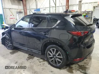 2018 Mazda CX-5 Grand Touring with VIN JM3KFADM3J0325843, listed as a Copart auction lot 87958375 with 93,577 mi miles and Salvage title. Bid and sale history available at DreamBid. Image 2.