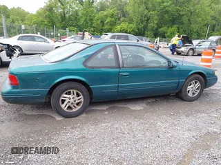 1996 Ford Thunderbird LX z VIN 1FALP62W9TH118637, wystawiony jako IAAI lot #42311641 z przebiegiem 96 361 mil mil oraz . Historia ofert i sprzedaży dostępna na DreamBid. Obrazek 13.