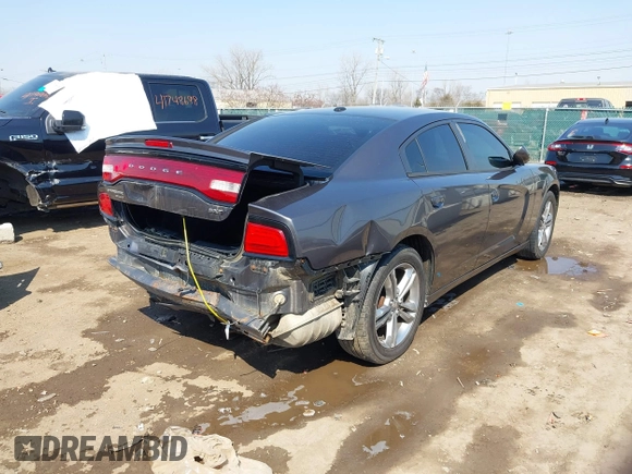 2014 Dodge Charger SXT Plus with VIN 2C3CDXJG0EH104680, listed as a IAAI auction lot 41784303 with 135,771 mi miles. Bid and sale history available at carsss.com. Image 4.