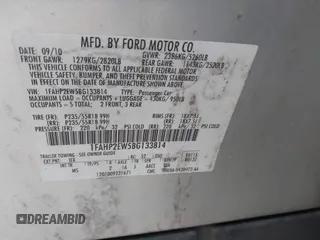 2011 Ford Taurus SEL with VIN 1FAHP2EW5BG133814, listed as a IAAI auction lot 41608224 with 127,075 mi miles. Bid and sale history available at carsss.com. Image 9.