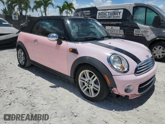 2013 MINI Convertible with VIN WMWZN3C50DT568977, listed as a Copart auction lot 60726495 with 86,319 mi miles and Clean title. Bid and sale history available at DreamBid. Image 4.