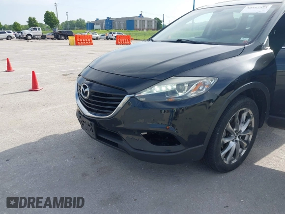 2015 Mazda CX-9 Grand Touring z VIN JM3TB2DA1F0456773, wystawiony jako IAAI lot #42257555 z przebiegiem 152 890 mil mil oraz . Historia ofert i sprzedaży dostępna na DreamBid. Obrazek 17.