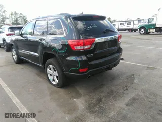 2011 Jeep Grand Cherokee Laredo with VIN 1J4RR4GTXBC538060, listed as a IAAI auction lot 41964694 with 152,999 mi miles. Bid and sale history available at carsss.com. Image 3.