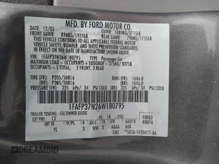 2006 Ford Focus S with VIN 1FAFP37N26W180795, listed as a IAAI auction lot 42100395 with 125,002 mi miles and . Bid and sale history available at carsss.com. Image 9.