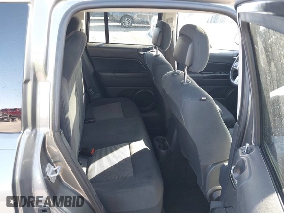 2011 Jeep Compass with VIN 1J4NT1FA0BD246586, listed as a IAAI auction lot 41253630 with 120,540 mi miles. Bid and sale history available at carsss.com. Image 8.