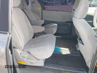 2014 Toyota Sienna LE AAS with VIN 5TDKK3DCXES432611, listed as a IAAI auction lot 40771635 with 214,145 mi miles and . Bid and sale history available at carsss.com. Image 8.