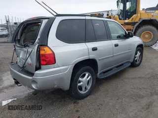 2006 GMC Envoy SLT with VIN 1GKDT13SX62342147, listed as a IAAI auction lot 40873738 with 159,092 mi miles. Bid and sale history available at carsss.com. Image 4.