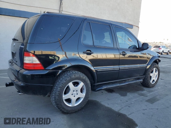 2001 Mercedes-Benz M-Class AMG with VIN 4JGAB74E71A223107, listed as a Copart auction lot 85156594 with 184,928 mi miles and Salvage Title. Bid and sale history available at carsss.com. Image 3.