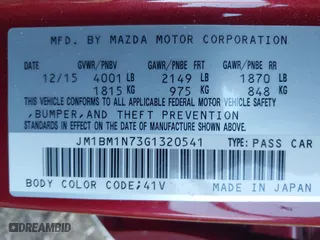 2016 Mazda Mazda3 i Grand Touring with VIN JM1BM1N73G1320541, listed as a IAAI auction lot 41694461 with 87,760 mi miles. Bid and sale history available at carsss.com. Image 9.