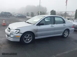 2002 Mitsubishi Lancer OZ-Rally with VIN JA3AJ86E92U038601, listed as a IAAI auction lot 41025991 with 162,450 mi miles. Bid and sale history available at carsss.com. Image 14.
