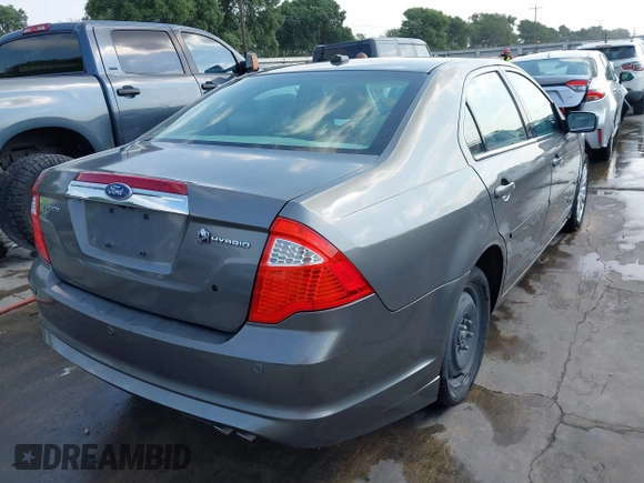 2010 Ford Fusion Hybrid with VIN 3FADP0L32AR342981, listed as a IAAI auction lot 42062235 with 287,126 mi miles. Bid and sale history available at carsss.com. Image 4.
