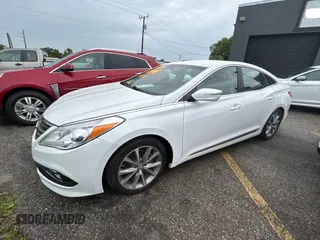 2016 Hyundai Azera z VIN KMHFG4JG4GA519447, wystawiony jako Copart lot #56961515 z przebiegiem 48 483 mil mil oraz Tytuł czysty. Historia ofert i sprzedaży dostępna na DreamBid. Obrazek 2.