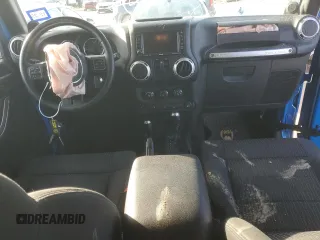2011 Jeep Wrangler Sahara with VIN 1J4GA5D15BL632709, listed as a Copart auction lot 84118104 with 87,644 mi miles and Salvage Title. Bid and sale history available at DreamBid. Image 8.