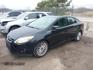2012 Ford Focus SEL with VIN 1FAHP3H27CL348358, listed as a IAAI auction lot 41967061 with 146,432 mi miles. Bid and sale history available at carsss.com. Image 2.