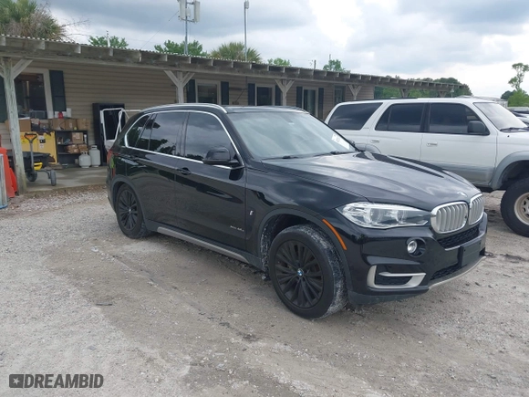2017 BMW X5 xDrive40e iPerformance with VIN 5UXKT0C30H0V95867, listed as a IAAI auction lot 42122827 with 84,271 mi miles. Bid and sale history available at carsss.com. Image 1.