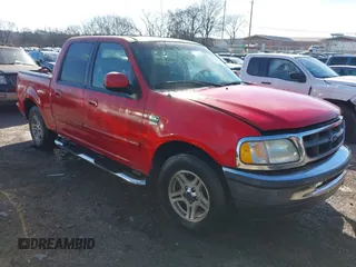2002 Ford F-150 XLT with VIN 1FTRW07612KD75533, listed as a IAAI auction lot 41602986 with 1 mi miles. Bid and sale history available at carsss.com. Image 1.