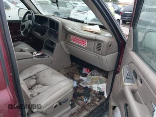 2005 GMC Yukon SLT with VIN 1GKEK13T85R206590, listed as a IAAI auction lot 41100996 with 1 mi miles. Bid and sale history available at carsss.com. Image 5.
