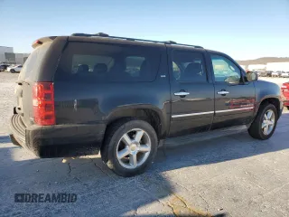 2012 Chevrolet Suburban LTZ with VIN 1GNSKKE71CR310010, listed as a Copart auction lot 48943445 with 311,512 mi miles and Clean title. Bid and sale history available at DreamBid. Image 3.