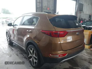 2017 Kia Sportage SX Turbo z VIN KNDPR3A6XH7167204, wystawiony jako IAAI lot #42403880 z przebiegiem 157 308 mil mil oraz . Historia ofert i sprzedaży dostępna na DreamBid. Obrazek 3.