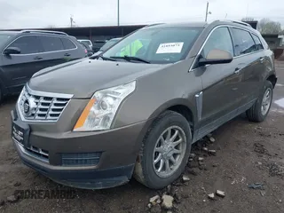 2015 Cadillac SRX Luxury Collection with VIN 3GYFNBE34FS521518, listed as a IAAI auction lot 41893073 with 82,700 mi miles and . Bid and sale history available at carsss.com. Image 2.