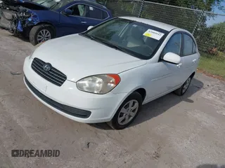 2011 Hyundai Accent GLS with VIN KMHCN4AC0BU613032, listed as a IAAI auction lot 42089042 with 132,518 mi miles. Bid and sale history available at carsss.com. Image 2.