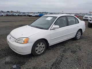 2002 Honda Civic EX with VIN 1HGES26702L074649, listed as a IAAI auction lot 40975048 with 151,975 mi miles and . Bid and sale history available at carsss.com. Image 2.