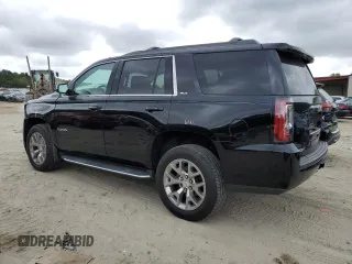 2017 GMC Yukon SLT with VIN 1GKS2BKC2HR406007, listed as a Copart auction lot 71702084 with 66,828 mi miles and Salvage Title. Bid and sale history available at carsss.com. Image 2.