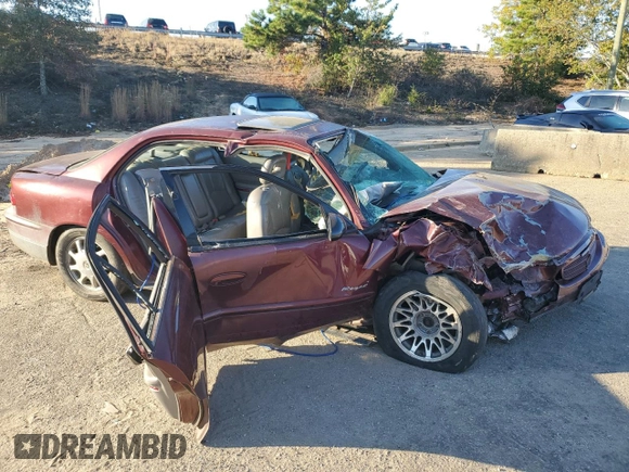 2000 Buick Regal GS with VIN 2G4WF5516Y1270238, listed as a Copart auction lot 77693904 with 0 mi miles and Salvage Title. Bid and sale history available at carsss.com. Image 4.