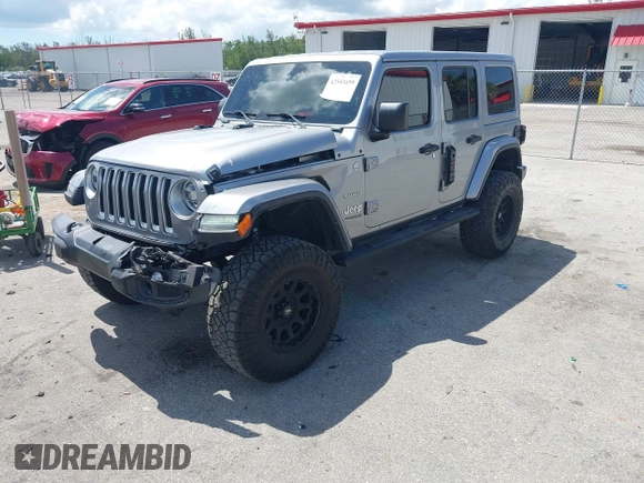 2021 Jeep Wrangler Unlimited Sahara with VIN 1C4HJXEN9MW637288, listed as a IAAI auction lot 42553459 with 39,362 mi miles and . Bid and sale history available at DreamBid. Image 2.