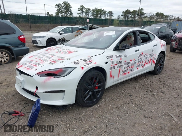 2023 Tesla Model S Plaid with VIN 5YJSA1E68PF507197, listed as a IAAI auction lot 42062258 with Not provided miles and . Bid and sale history available at DreamBid. Image 23.