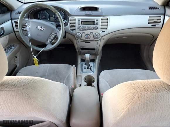2007 Kia Optima LX with VIN KNAGE123475137191, listed as a Copart auction lot 83466394 with 0 mi miles and Clean Title. Bid and sale history available at carsss.com. Image 8.