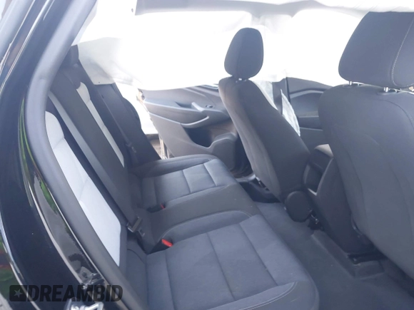 2025 Chevrolet Trax LS with VIN KL77LFEP8SC083660, listed as a IAAI auction lot 41993641 with 6,667 mi miles and . Bid and sale history available at DreamBid. Image 8.