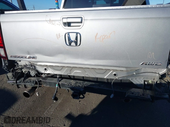 2022 Honda Ridgeline RTL-E with VIN 5FPYK3F78NB016045, listed as a IAAI auction lot 41626864 with 57,130 mi miles and . Bid and sale history available at DreamBid. Image 6.