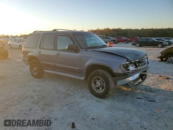 1997 Ford Explorer XL with VIN 1FMDU34XXVUC61582, listed as a Copart auction lot 81957344 with 153,852 mi miles and Salvage title. Bid and sale history available at DreamBid. Image 12.