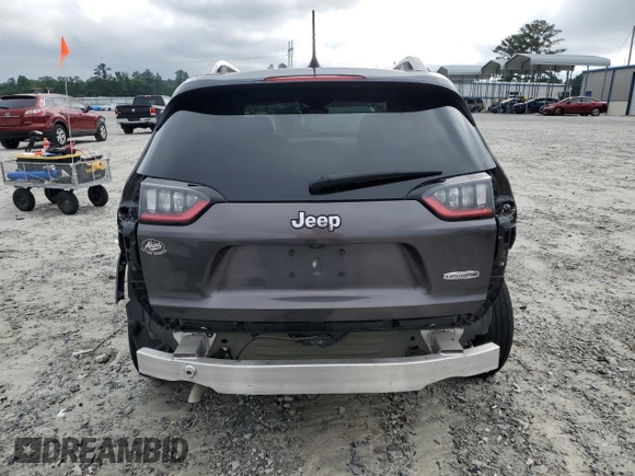 2021 Jeep Cherokee Altitude с VIN 1C4PJLLB5MD112348, выставлен на аукционе Copart как лот 59536115 с пробегом 129 897 миль миль и Списание • Salvage title. История ставок и продаж доступна на DreamBid. Изображение 6.