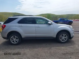 2016 Chevrolet Equinox LT z VIN 2GNFLFEK8G6269953, wystawiony jako IAAI lot #42174989 z przebiegiem 136 752 mil mil oraz . Historia ofert i sprzedaży dostępna na DreamBid. Obrazek 13.