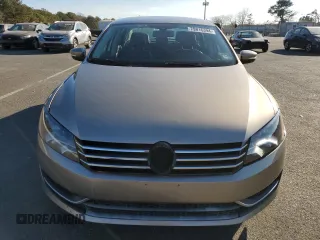 2015 Volkswagen Passat 1.8T Wolfsburg Ed with VIN 1VWAT7A34FC032404, listed as a Copart auction lot 79816394 with 64,820 mi miles and Clean Title. Bid and sale history available at carsss.com. Image 5.