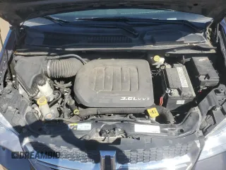 2016 Dodge Grand Caravan SXT with VIN 2C4RDGCG8GR379326, listed as a Copart auction lot 54577495 with 116,019 mi miles and Salvage Title. Bid and sale history available at DreamBid. Image 12.