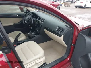 2016 Volkswagen Jetta Sedan 1.8T SEL with VIN 3VWL07AJ7GM392816, listed as a IAAI auction lot 41288306 with 55,915 mi miles. Bid and sale history available at carsss.com. Image 5.