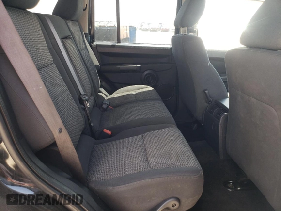 2008 Jeep Commander Sport z VIN 1J8HG48K38C180234, wystawiony jako Copart lot #55959325 z przebiegiem 198 459 mil mil oraz Szkoda całkowita • Salvage title. Historia ofert i sprzedaży dostępna na DreamBid. Obrazek 11.