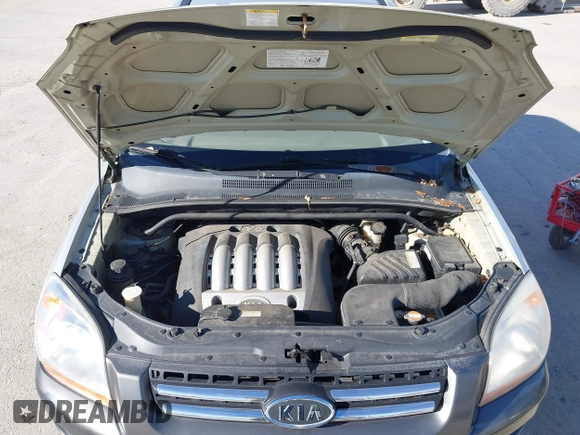 2005 Kia Sportage LX with VIN KNDJE723757081826, listed as a IAAI auction lot 41775450 with 106,992 mi miles and . Bid and sale history available at carsss.com. Image 10.