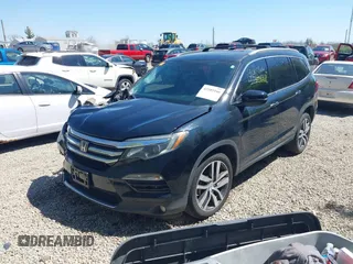 2016 Honda Pilot Elite with VIN 5FNYF6H08GB070057, listed as a IAAI auction lot 42103166 with Not Provided miles. Bid and sale history available at carsss.com. Image 2.