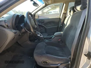 2002 Pontiac Grand Am GT1 with VIN 1G2NV52E52M626348, listed as a Copart auction lot 87703175 with 91,215 mi miles and Salvage Title. Bid and sale history available at carsss.com. Image 7.