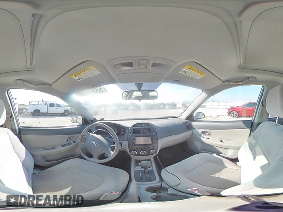 2009 Kia Spectra EX with VIN KNAFE221295654167, listed as a Copart auction lot 53377745 with 131,266 mi miles and Salvage Title. Bid and sale history available at DreamBid. Image 15.