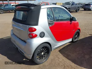 2009 Smart fortwo Passion with VIN WMEEK31X99K294322, listed as a IAAI auction lot 42014658 with Not Provided miles. Bid and sale history available at carsss.com. Image 4.