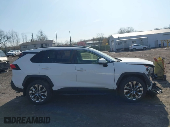 2019 Toyota RAV4 XLE Premium with VIN JTMA1RFV9KD013771, listed as a IAAI auction lot 42055558 with 36,585 mi miles. Bid and sale history available at carsss.com. Image 13.