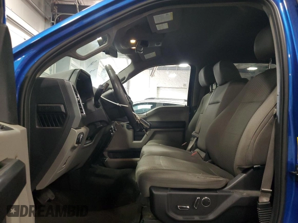 2015 Ford F-150 XLT with VIN 1FTEW1EF8FFA39867, listed as a Copart auction lot 57113965 with 86,807 mi miles and Salvage title. Bid and sale history available at DreamBid. Image 7.